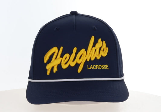 A navy blue lacrosse cap featuring 'Heights' embroidered in yellow script across the front, with 'LACROSSE' in smaller yellow block letters underneath and a thin white stripe along the edge of the brim.